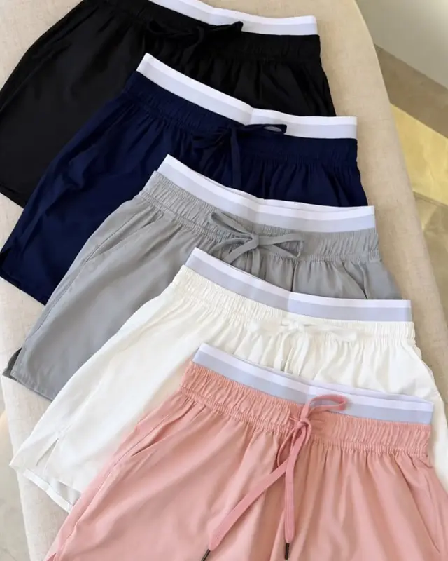 Short duplo em cinco cores, os cinco shorts dobrados
